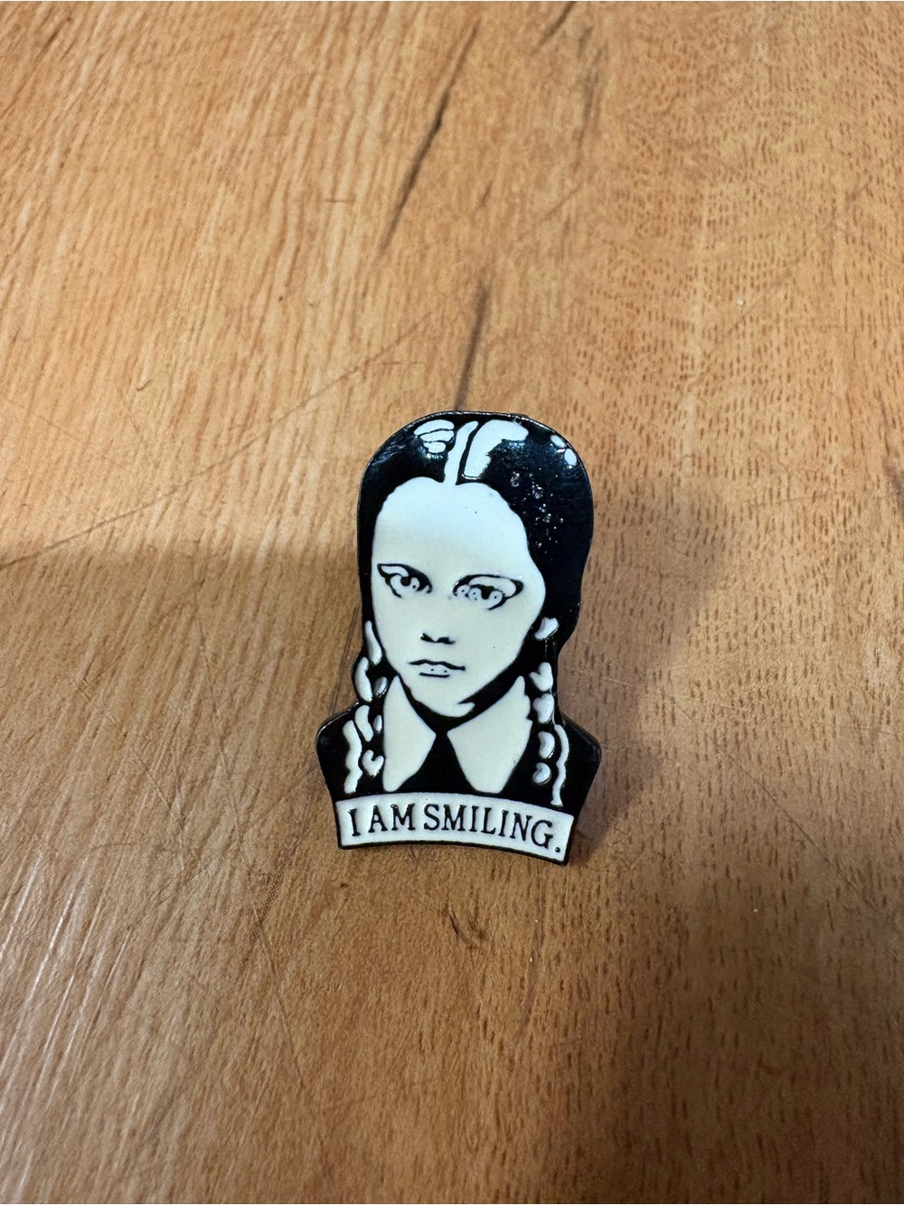 Wednesday Addams “I am smiling” enamel pin